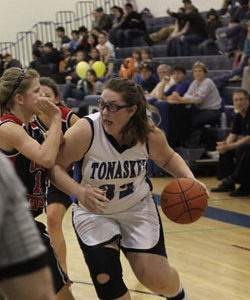 Tonasket junior Jayden Hawkins moves the ball toward the basket during the Lady Tigers’ final home game of the season on Tuesday, Feb. 9. Photo by Terry Mills