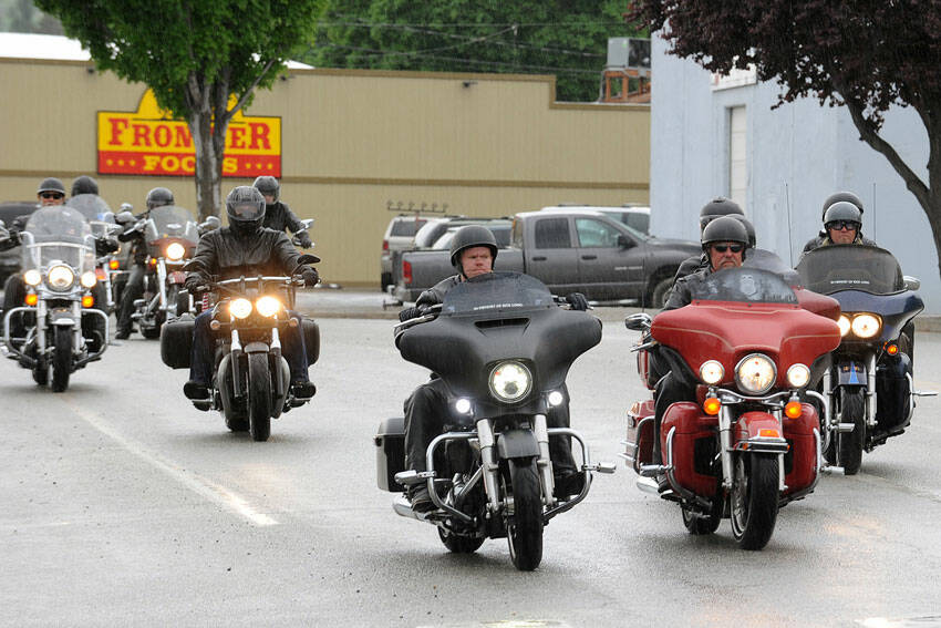 Riders arrive in Oroville from Wenatchee during the 2018 Run for the Border. Gary De Von/GT file photo