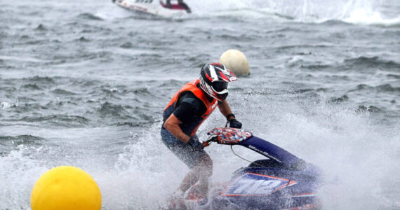 Chris Wolley, one of the irganizers of the Lake Osoyoos Cup races, rounds a bouy in apast race. <em>GT file photo</em>