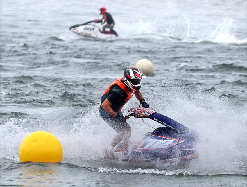 Chris Wolley, one of the irganizers of the Lake Osoyoos Cup races, rounds a bouy in apast race. <em>GT file photo</em>