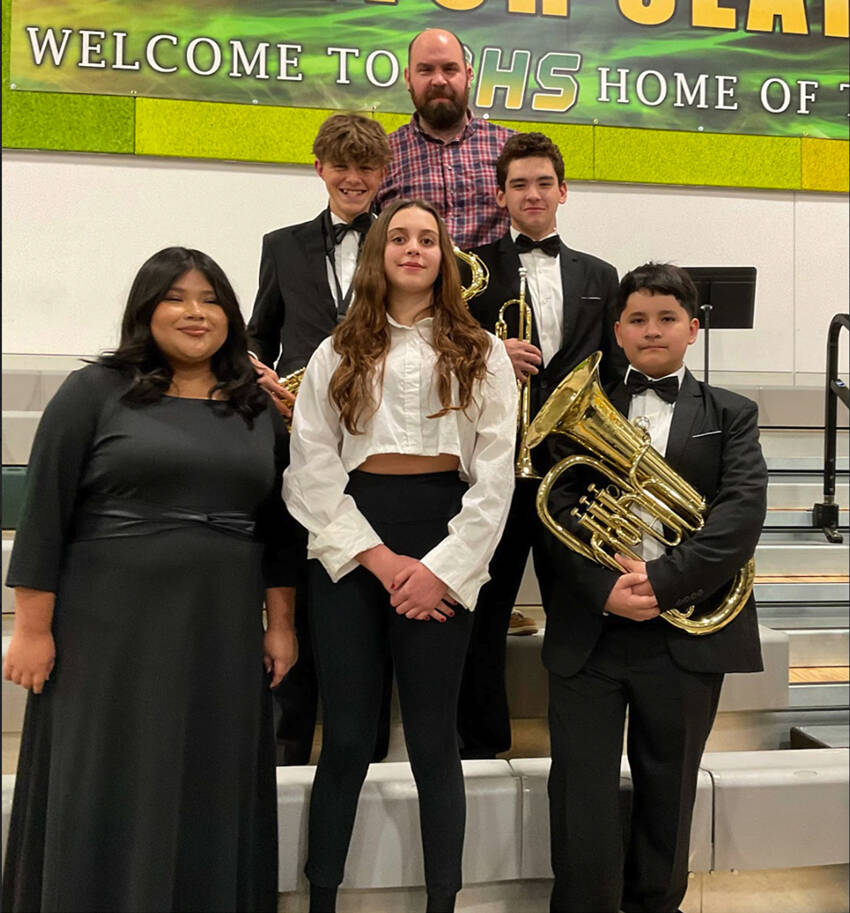 Aria Dalzell-Speers, Ruben Castro, Noah Graves, Marlene Diaz and Abran Guzman with their teacher Casey McNett.