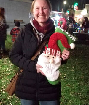 Stephanie Hart and some of the goodies she won by participating in the Elf on a Shelf Hunt sponsored by the Oroville Chamber of Commerce. Angela Larson/staff photo.