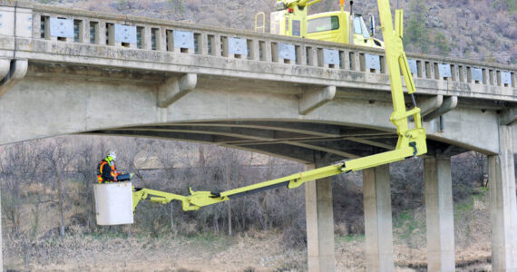 The Washington State Department of Transportation inspects the SR97 bridge over the Okanogan River south of Oroville in April of 2021. Gary De Von/GT File Photo