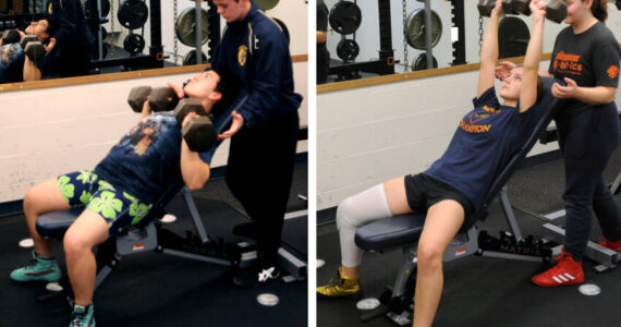 Maico Duarte, left,, was one of the Oroville Hornet Wrestlers last week who took part in the liftathon to raise money for the team. Also lifting for the team was Erin Dimello. Coach Chuck Ricevuto who also lifted said, “Everyone on the team lifted and I think we raised close to $3000, which is a new record.” Gary DeVon/staff photos