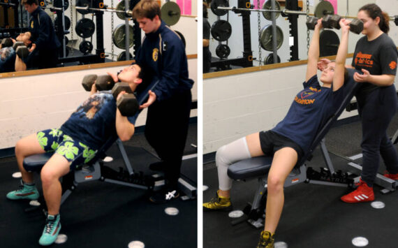 Maico Duarte, left,, was one of the Oroville Hornet Wrestlers last week who took part in the liftathon to raise money for the team. Also lifting for the team was Erin Dimello. Coach Chuck Ricevuto who also lifted said, “Everyone on the team lifted and I think we raised close to $3000, which is a new record.” Gary DeVon/staff photos