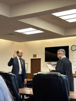 Rep. Andrew Engell, R-Colville, took his oath of office at the Stevens County Courthouse on Jan. 10, which Superior Court Judge Lech J. Radimski administered. Submitted photo