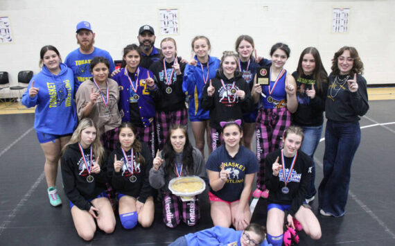 Tonasket Tigers Girls Wrestling with their apple pie after winning their first-ever Girls Apple Pie Tournament on Jan. 18. Submitted photo