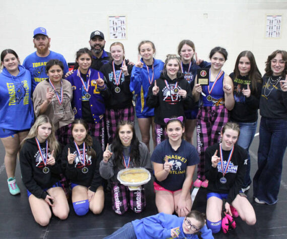 Tonasket Tigers Girls Wrestling with their apple pie after winning their first-ever Girls Apple Pie Tournament on Jan. 18. Submitted photo