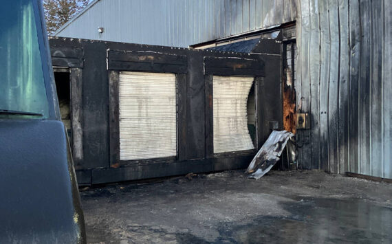 Some of the fire damage at the UPS loading dock in Omak. The fire is suspected to have broken out after a suspect is alleged to have drilled into a UPS truck’s gas tank and a spark from the drill set the truck ablaze. OPD/submitted photo