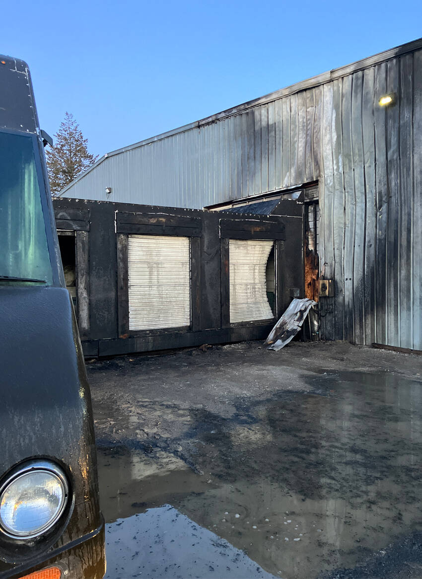 Some of the fire damage at the UPS loading dock in Omak. The fire is suspected to have broken out after a suspect is alleged to have drilled into a UPS truck’s gas tank and a spark from the drill set the truck ablaze. OPD/submitted photo