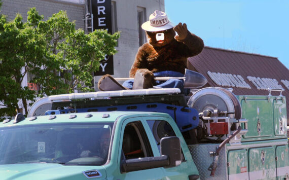 Smokey Bear rides on top of a U.S. Forest Service (USFS) truck in the May Festival Parade. Smokey is a familiar sight at May Fest as well as events around the country and his “Only You Can Prevent Forest Fires” is familiar to nearly every school-age child in the nation. The Department of Natural Resources (DNR) has teamed up with none other than the iconic Smokey Bear. The DNR has received funding from the USFS to wrap 10 trailers with Smokey’s image, as well as fire prevention information and resources. Gary DeVon/GT file photo