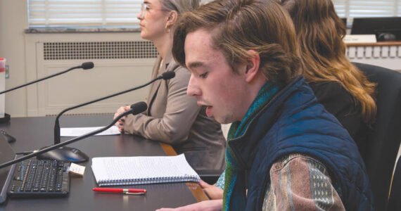 Sebastian Ford (front), a Bainbridge resident and a high school student, shares his testimony during a public hearing for HB 1631 on Feb. 4. Ford is one of the people who spearheaded the drafting of the bill. Photo by Juan Jocom