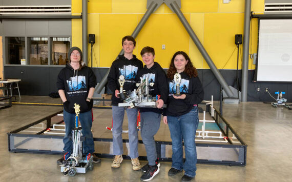 Oroville Team CWU09, l-r, with driver-engineer Elias DeFord, a junior; Jaxon Darley, a freshman; Travis Darley, a 7th grader and Erin Gimello, a sophomore, received the Tournament Champion award. Submitted photo